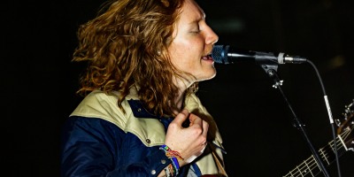 A close up image of the lead singer of the band Flor