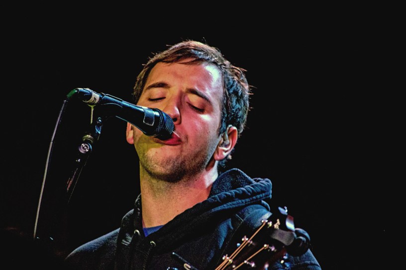 A photo of musician Mat Kerekes on stage